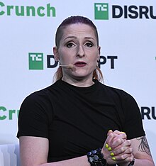 Carhart facing camera and speaking during TechCrunch Disrupt panel