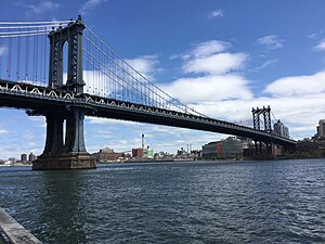 The Manhattan Bridge located in East River, New York, USA, as viewed from the south.