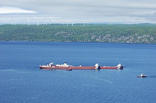 MV Roger Blough aground in Whitefish Bay with Prince Wind Farm in the background