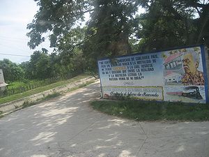 Billboard of Gabriel García Márquez in Aracataca. The billboard reads: "I feel I am an American from every country, without never renouncing to the nostalgia for my land, to which I returned one day and discovered that between the reality and nostalgia was the Feedstock for my work". - Gabriel García Márquez