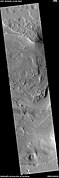 Wide view of ridges, as seen by HiRISE under HiWish program. A channel segment is also visible in the image.