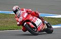Loris Capirossi riding his Ducati Desmosedici GP5 in 2005 with an alternative red & black "barcode" livery.