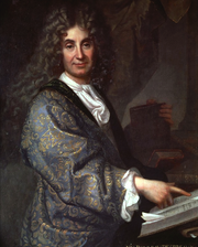 Portrait d'un homme en perruque et riche robe de chambre.