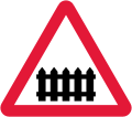 Level crossing with gate or barrier ahead