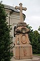 The Theophany Cross monument in the church's courtyard