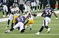 Ray Lewis (52) and Terrell Suggs (55) of the Ravens chase down Steelers Willie Parker, 2006.