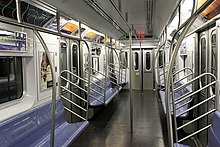 The interior of an R142A car on the 4 train.