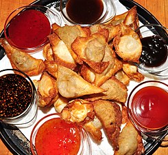 Triangular fried crab rangoons