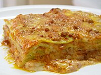 Green lasagna (made with spinach in the dough), with ragù, Parmesan and béchamel, typical of Bolognese cuisine