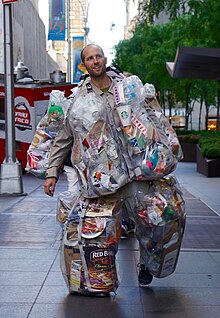 Robin Greenfield wearing a plastic suit full of trash in New York City in 2016 during the Trash Me campaign