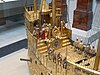 Model of a galleon with small figurines aboard