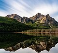 Mystery Mountain (left) and McGowan Peak (right) illuminated by moonlight and reflected in Stanley Lake