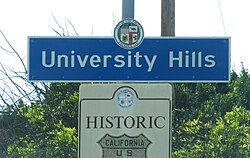 University Hills neighborhood sign located at the intersection of Valley Boulevard and Highbury Avenue