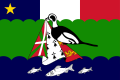 A rectangular flag displaying the upper part of a French tricolor with a yellow star on the left. A green horizontal band is defaced by a black and white bird holding folded Basque, Breton and Norman flags from its beak. On the bottom blue band, there are three white fish.