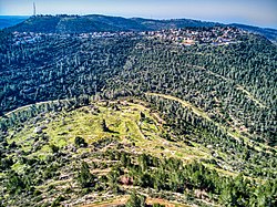 The spur on which the village was located, and on the other side of the riverbed, on the hill, Giv'at Ye'arim that was built on the village land