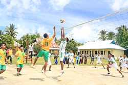 Students seen playing volleyball at the local school