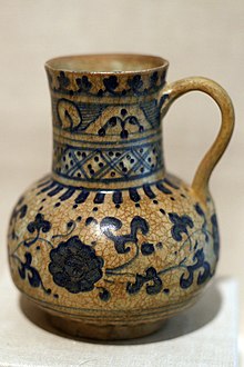 A single handled jug, Ceramic, off-white body, cobalt blue underglaze, transparent colorless glaze