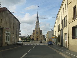 The church and surroundings in Douzy