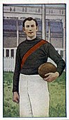 1922 J.J. Schuh Magpie Cigarettes Victorian League Footballers cigarette card featuring Essendon player Fred Baring.