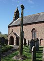 View of the cross and church, from the SE