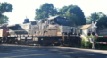 Norfolk Southern eastbound train passing through Three Bridges, Readington Township, New Jersey on the Lehigh Line, Picture 1. A BNSF GEVO can be seen trailing NS 9594.