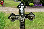 Grabkreuz für einen durch eine verirrte Kugel getroffenen Einwohner auf dem Oeverseer Friedhof