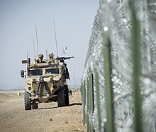 No. 51 Squadron RAF Regiment Foxhound vehicle on patrol at the perimeter of Camp Bastion, Afghanistan in 2014.