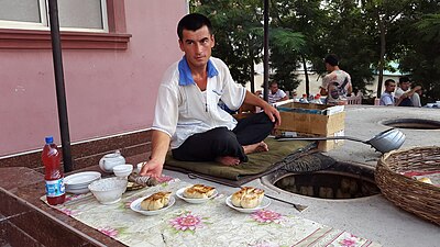 Uzbek with traditional cuisine.