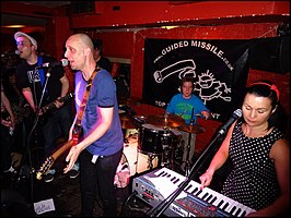 Bis performing at London's Buffalo Bar in 2012. L-R: John Disco, Sci-fi Steven, Manda Rin.