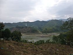 The confluence of the Red River and the Lonbao River (龙保河) is the northernmost point of Bát Xát District