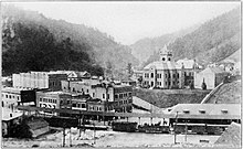 Black and white photograph view of buildings in downtown Welch, West Virginia, in 1915.