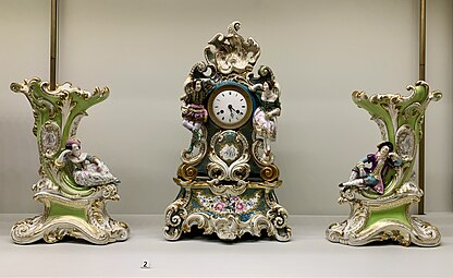 Rococo Revival pair of cone-shaped vases and a clock, by Nicolas Bugeard?, mid-19th century, hard-paste porcelain, painted and gilded, Museum of Decorative Arts, Paris