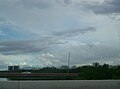 Bridge on PR-22 over Martín Peña with Milla de Oro and El Yunque in the background