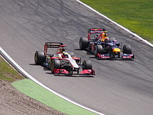 Photographie de Pedro de la Rosa et Mark Webber au Grand Prix d'Allemagne