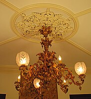 Four-tier brass Victorian chandelier in the John Thompson House.