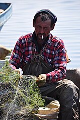 Local Kazakh fisherman harvesting the day's catch