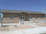 The Laveen School Auditorium was built in 1925 and is located at 5001 W. Dobbins Road. The building was listed in the National Register of Historic Places on August 30, 2011, reference #88001601.