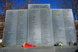 Grey marble slab with names of victims listed