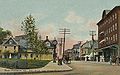 A postcard illustrating a view north along Main Street beside the park (c. 1908)