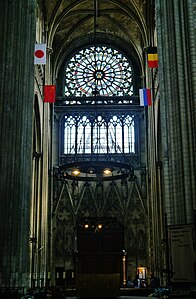 Interior of the south transept, with rose window