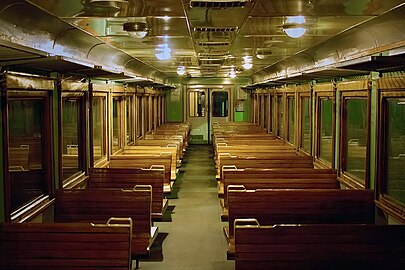 Interior of an intermediate car with wooden seats