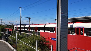 White-and-red train at platform