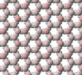 View of tetrahedral sheet structure of talc. The apical oxygen ions are tinted pink.