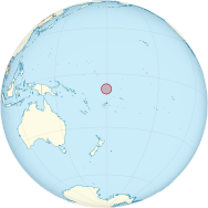 Map of globe focused on the Pacific Ocean, with a red circle showing where Tuvalu is located
