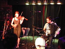 Heather Trost and Jeremy Barnes of A Hawk and a Hacksaw, performing in 2009