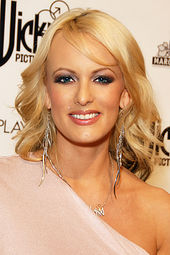 Stormy Daniels smiling at the camera