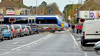 Class 4000 Train crossing William Street level crossing outside Lurgan Train Station in 2012