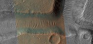 Close, color view of TAR's in a channel,as seen by HiRISE under HiWish program Only part of the image is in color because HiRISE only takes a 1 km wide color strip.