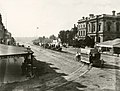 About 1880 : A late afternoon horse tram in King William Street; some of the 10 wagonettes will take passengers from it.