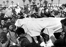 A black and white photo of the funeral of Touria Chaoui in Morocco.
